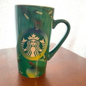 Starbucks coffee mug.
